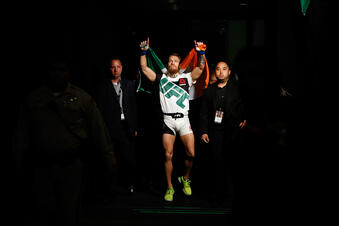 LAS VEGAS, NV - JULY 11: Conor McGregor walks to the Octagon to face Chad Mendes in their UFC interim featherweight title fight during the UFC 189 event inside MGM Grand Garden Arena on July 11, 2015 in Las Vegas, Nevada. (Photo by Christian Petersen/Zuffa LLC/Zuffa LLC via Getty Images)